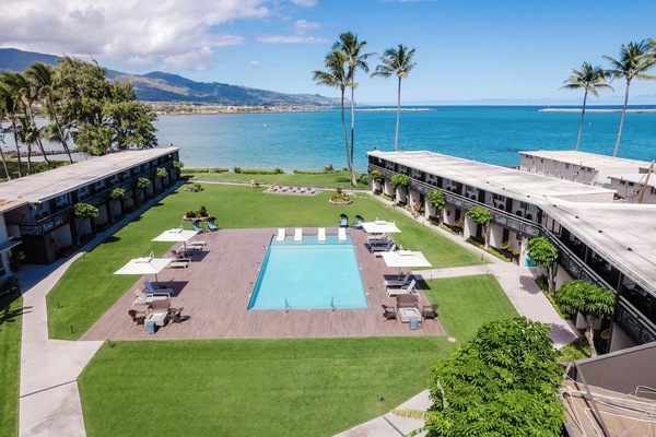 Soak up oceanfront sunshine beside the resort-style pool oasis.
