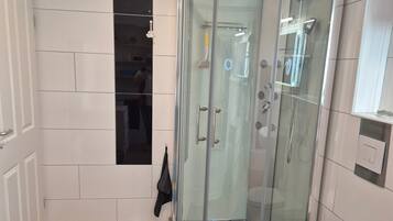 Shower, hair dryer, towels