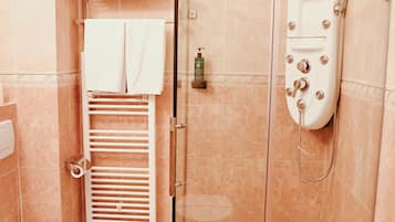 Deluxe Room, 1 King Bed with Sofa bed | Bathroom | Shower, rainfall showerhead, free toiletries, hair dryer