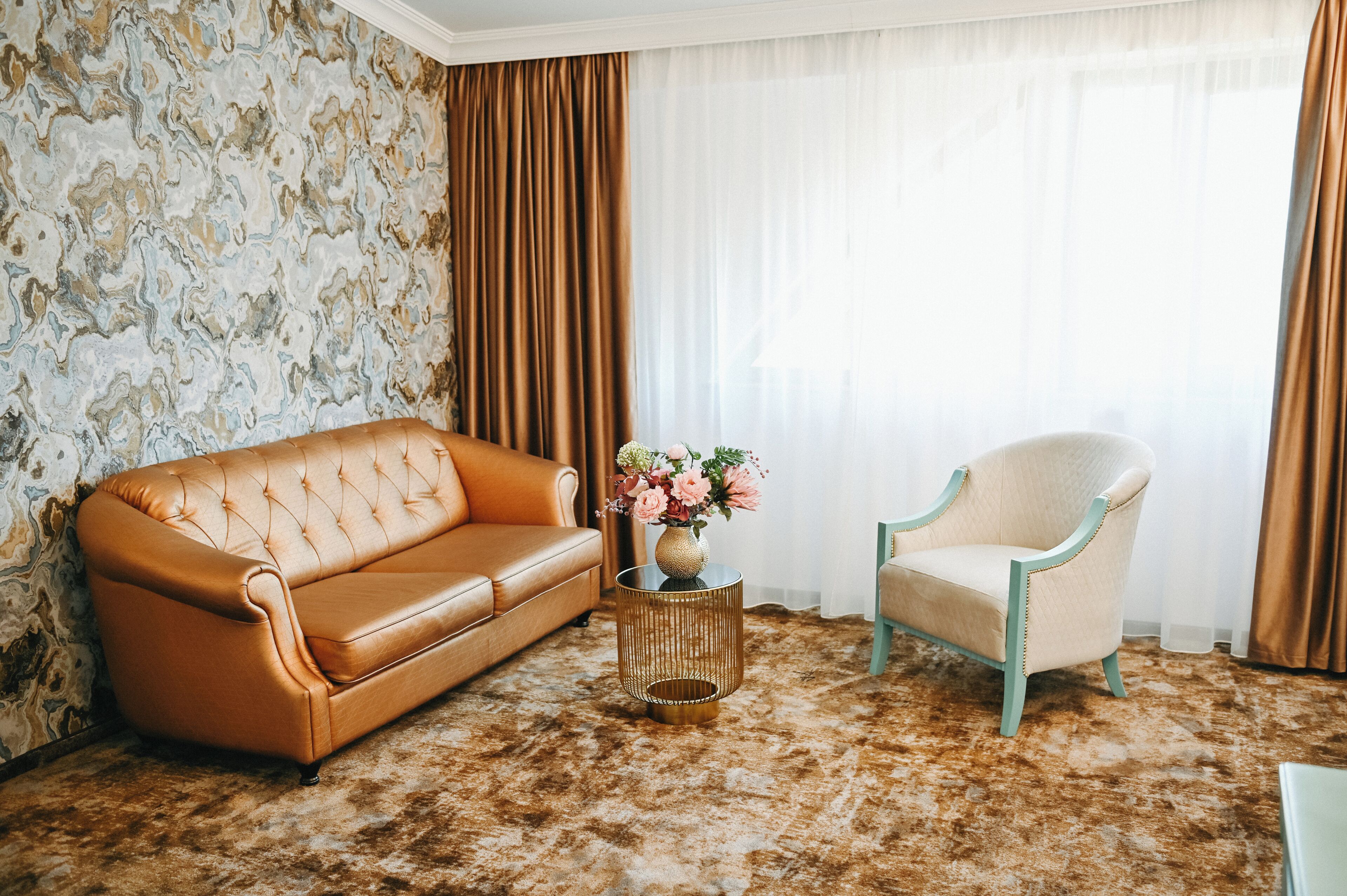 Deluxe Room, 1 King Bed with Sofa bed | Living area | 122-cm TV with cable channels