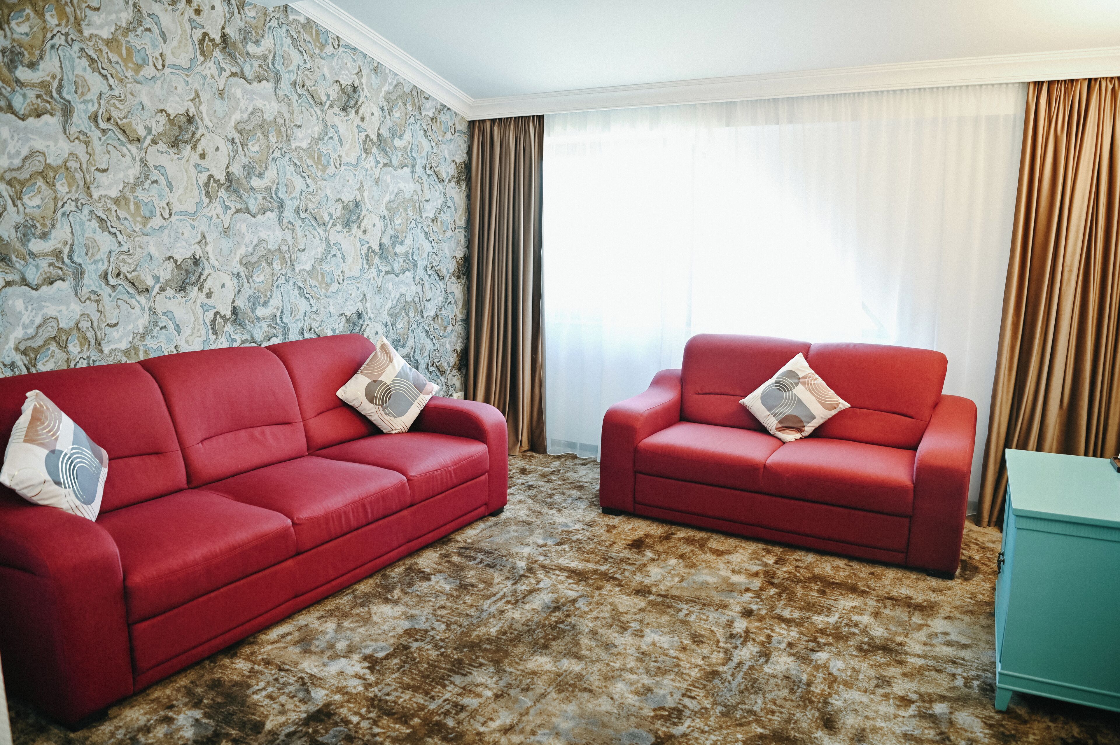 Deluxe Room, 1 King Bed with Sofa bed | Living area | 122-cm TV with cable channels