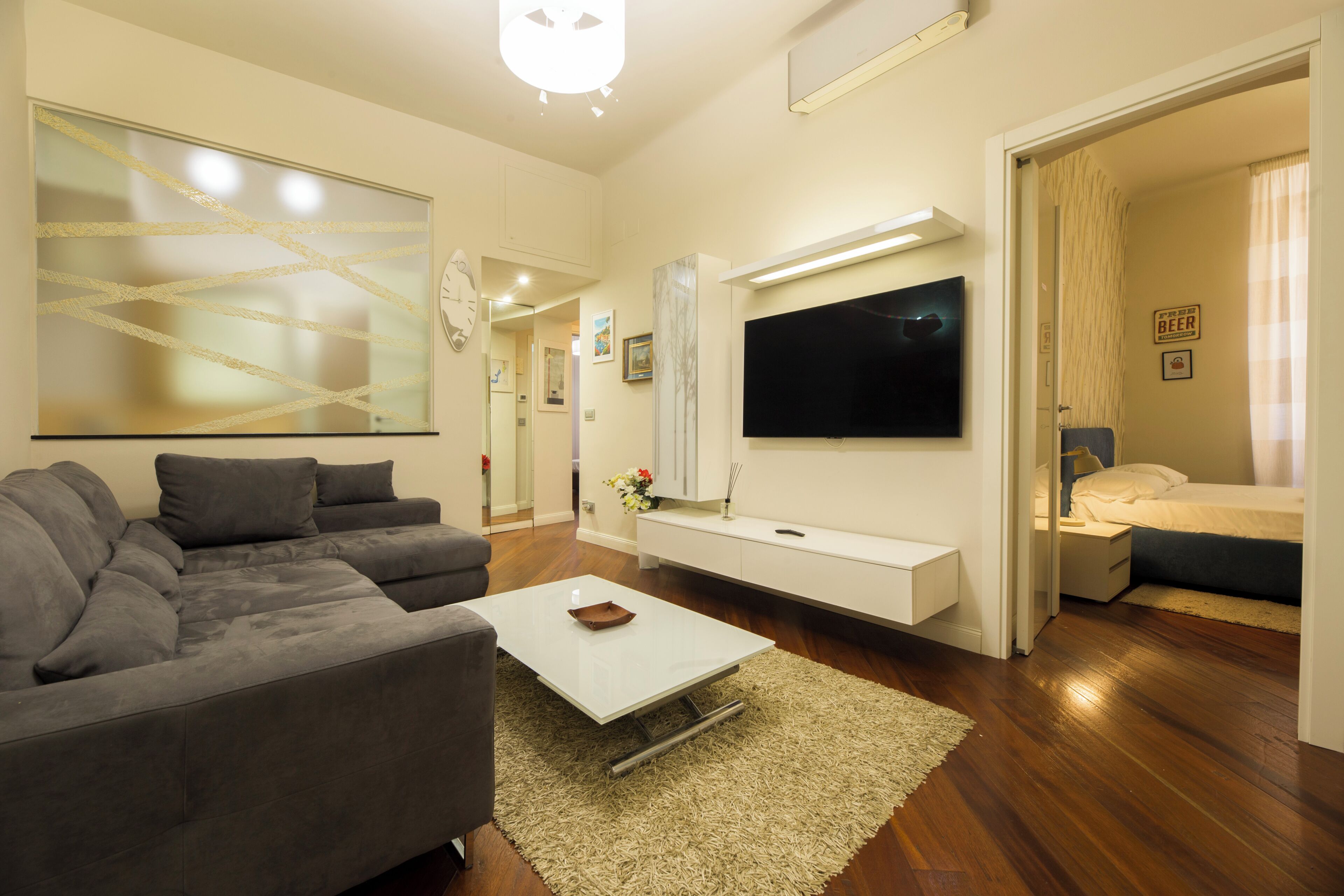 Apartment, 3 Bedrooms, 2 Bathrooms | Living area | 32-inch flat-screen TV with cable channels