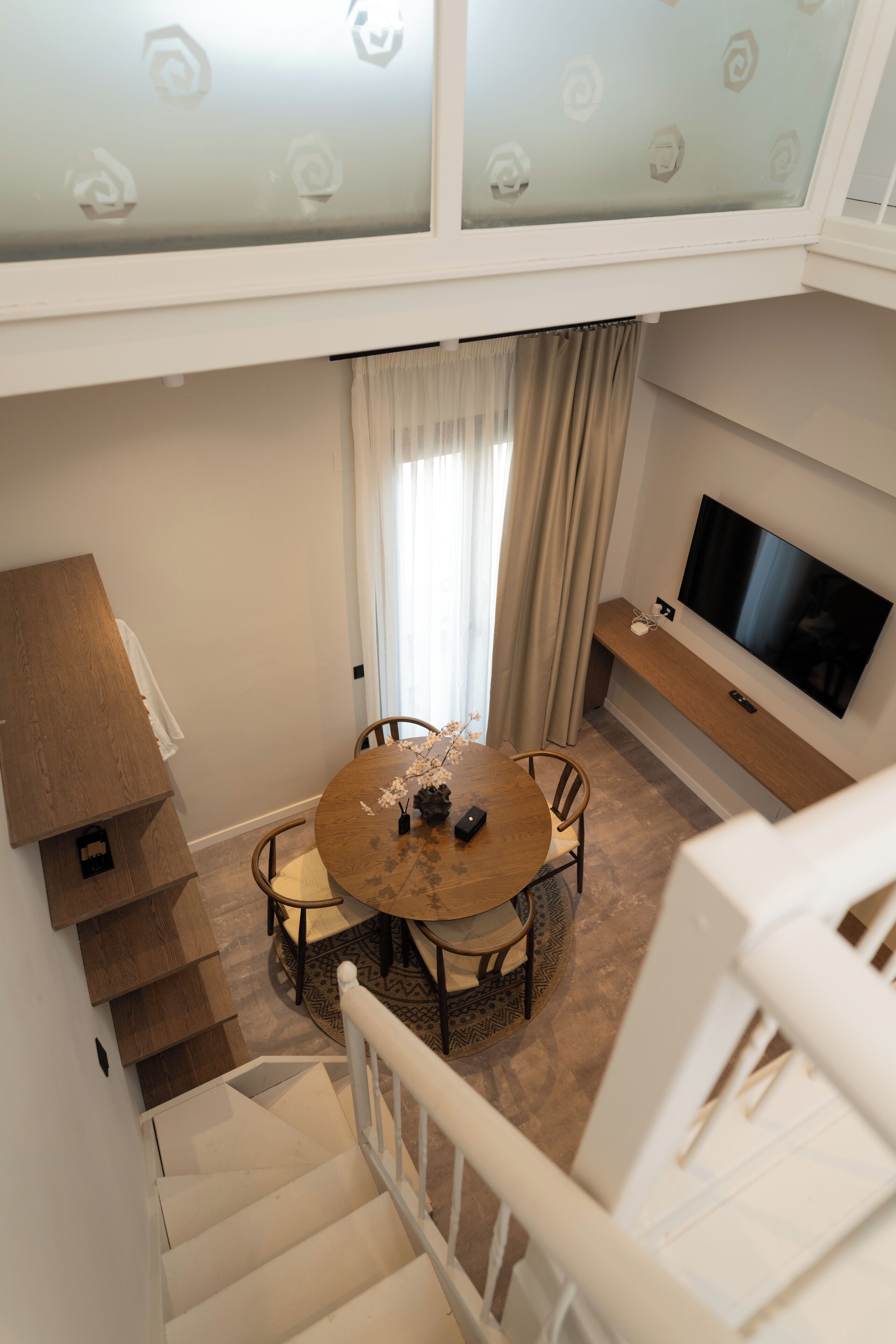 Deluxe Apartment, Balcony | Living area | 50-inch Smart TV with digital channels, Netflix, streaming services