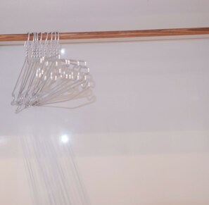 A ceiling with a wooden trim and a series of metal hooks. - Apartment near Tan Son Nhat Airport (Tan Son Hoa)