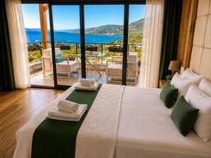 Doppia Deluxe, patio, vista mare | Una scrivania, Wi-Fi gratuito