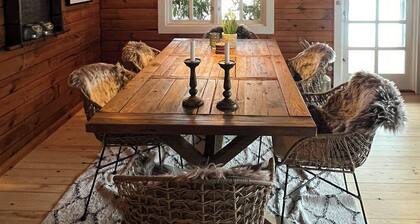 Authentic log cabin on large enclosed natural plot