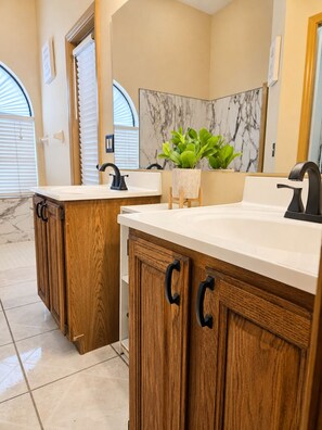 Shower, towels, soap, toilet paper - Where Comfort Meets Vacation Cozy Pool Home Relax • Recharge • Explore (Orlando)