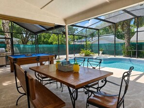 Outdoor dining - Where Comfort Meets Vacation Cozy Pool Home Relax • Recharge • Explore (Orlando)