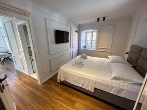 Apartment | Frette Italian sheets, premium bedding, blackout curtains