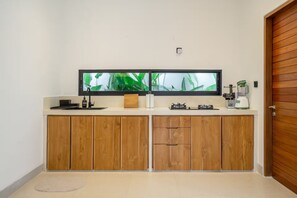 Vila superluxo, 2 quartos, piscina particular | Cozinha privada | Chaleira elétrica, produtos de limpeza biodegradáveis disponíveis