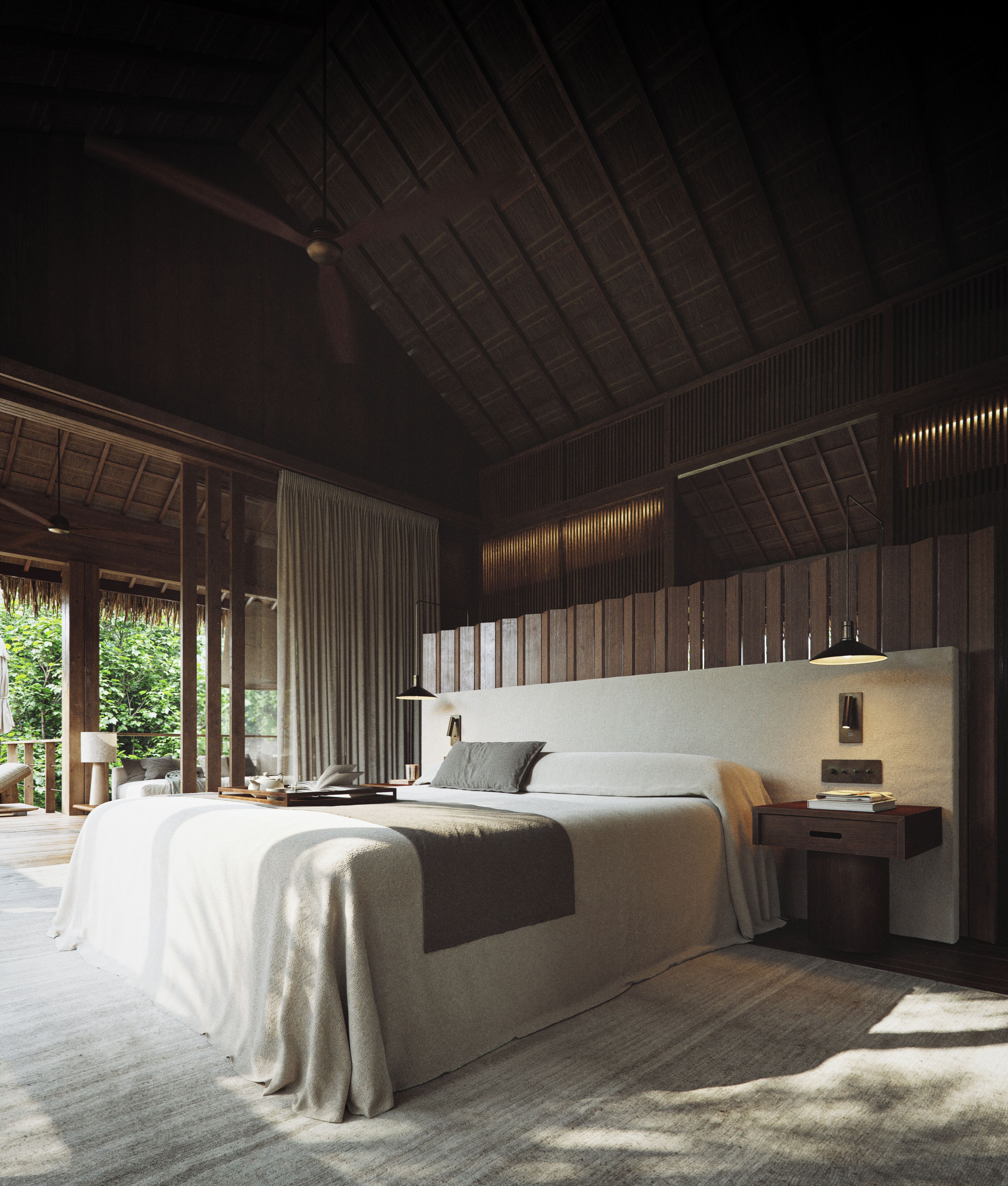 A spacious bedroom with a large bed, a nightstand, and a ceiling fan.
