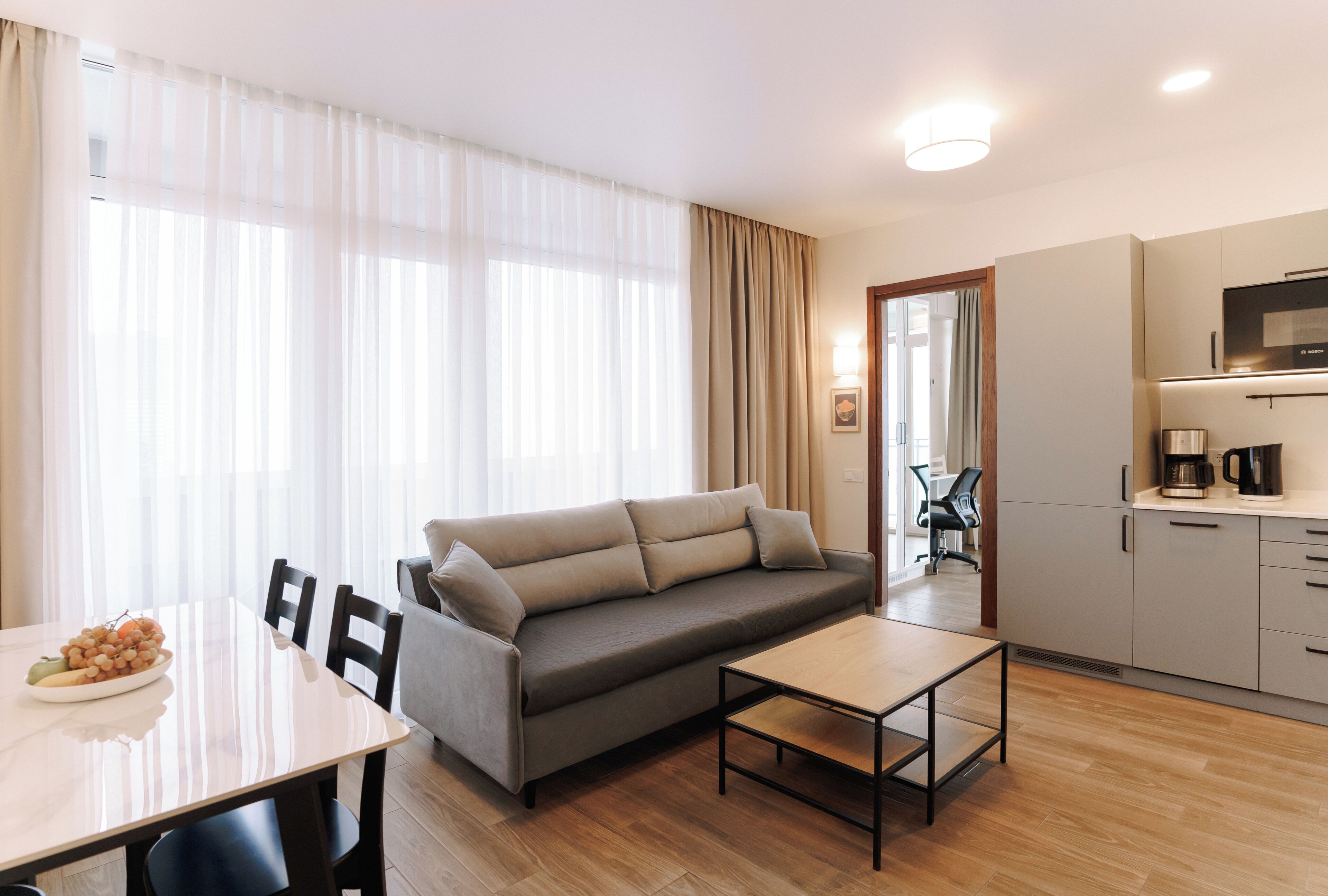 Superior-Apartment, Balkon, Meerblick | Wohnbereich