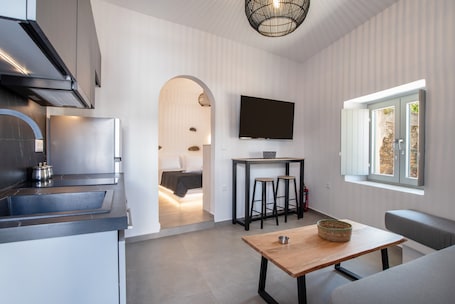 Interior. Naexon Vivlos Stone Escape Apartment with Shared Rooftop, Wi-Fi, and Air Conditioning