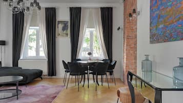 Deluxe Apartment, 1 Bedroom, City View, Beachside | Living area | 40-inch Smart TV with cable channels