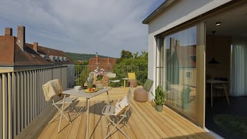 Deluxe Penthouse, Balcony | Blackout curtains, iron/ironing board (on request), free WiFi
