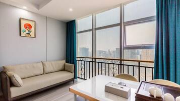 Comfort Quadruple Room, City View | Living area | Printers