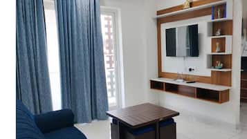 Quarto casal luxo | Área de estar