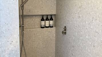 Shower, hair dryer, towels, soap
