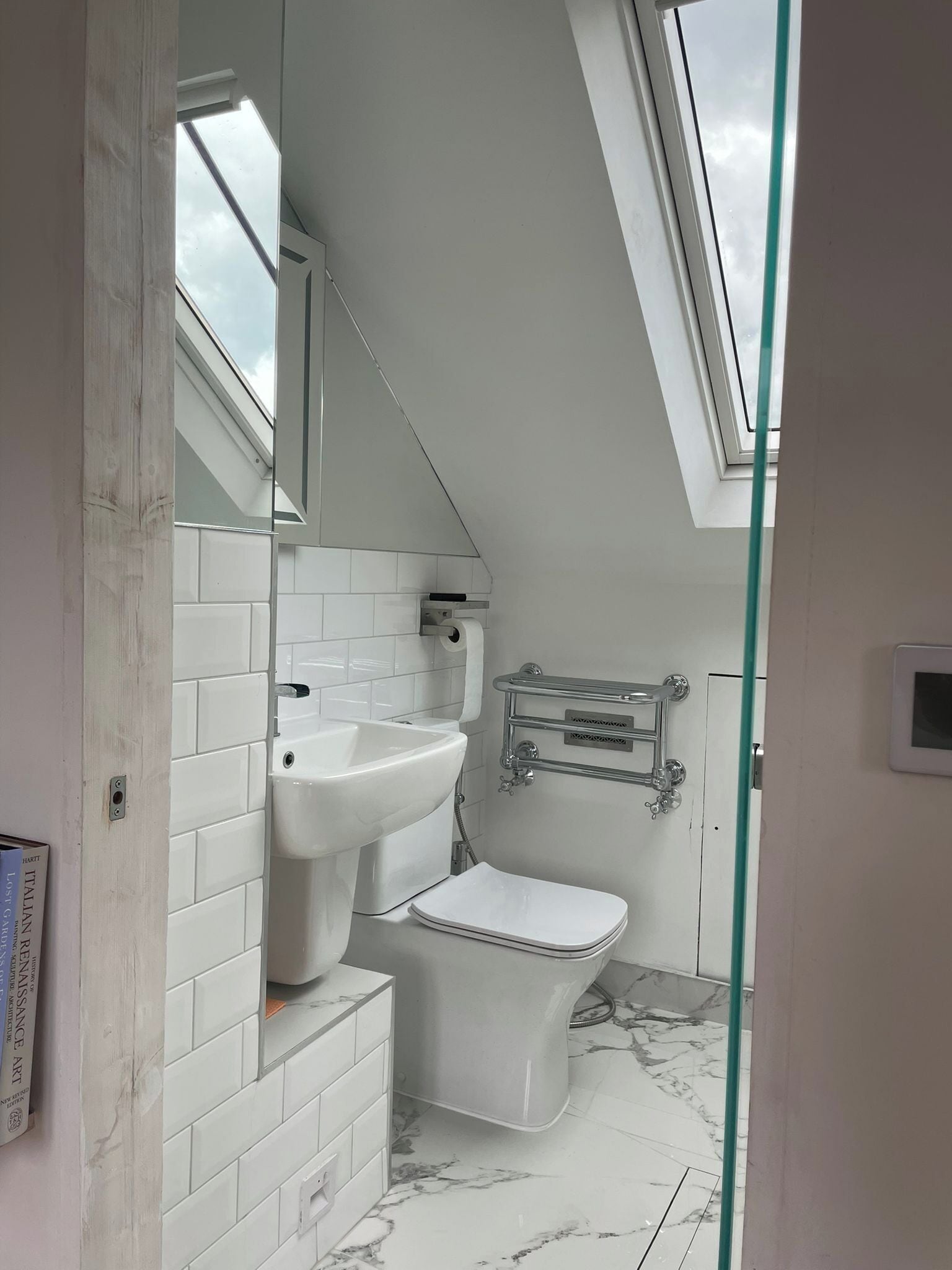 Combined shower/bathtub, deep-soaking bathtub, towels