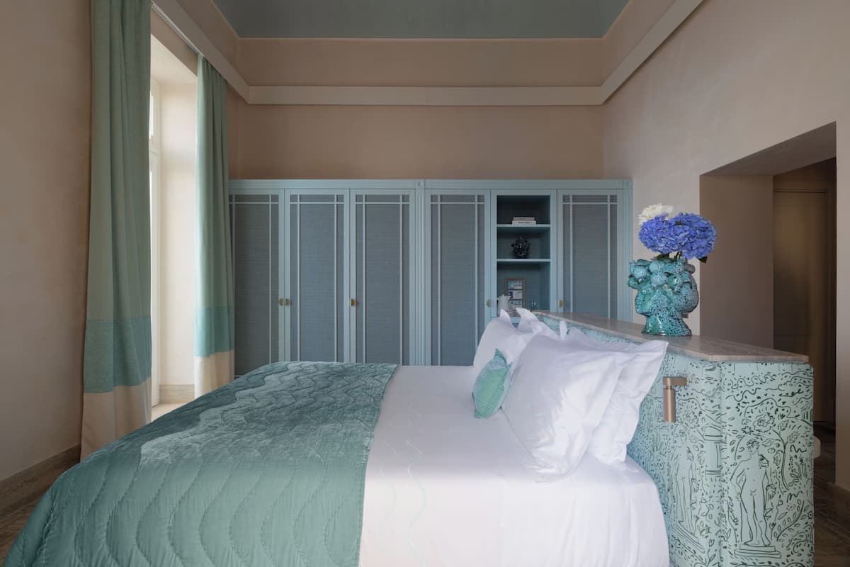 Habitación doble Deluxe, vista al mar | Ropa de cama de alta calidad y minibar