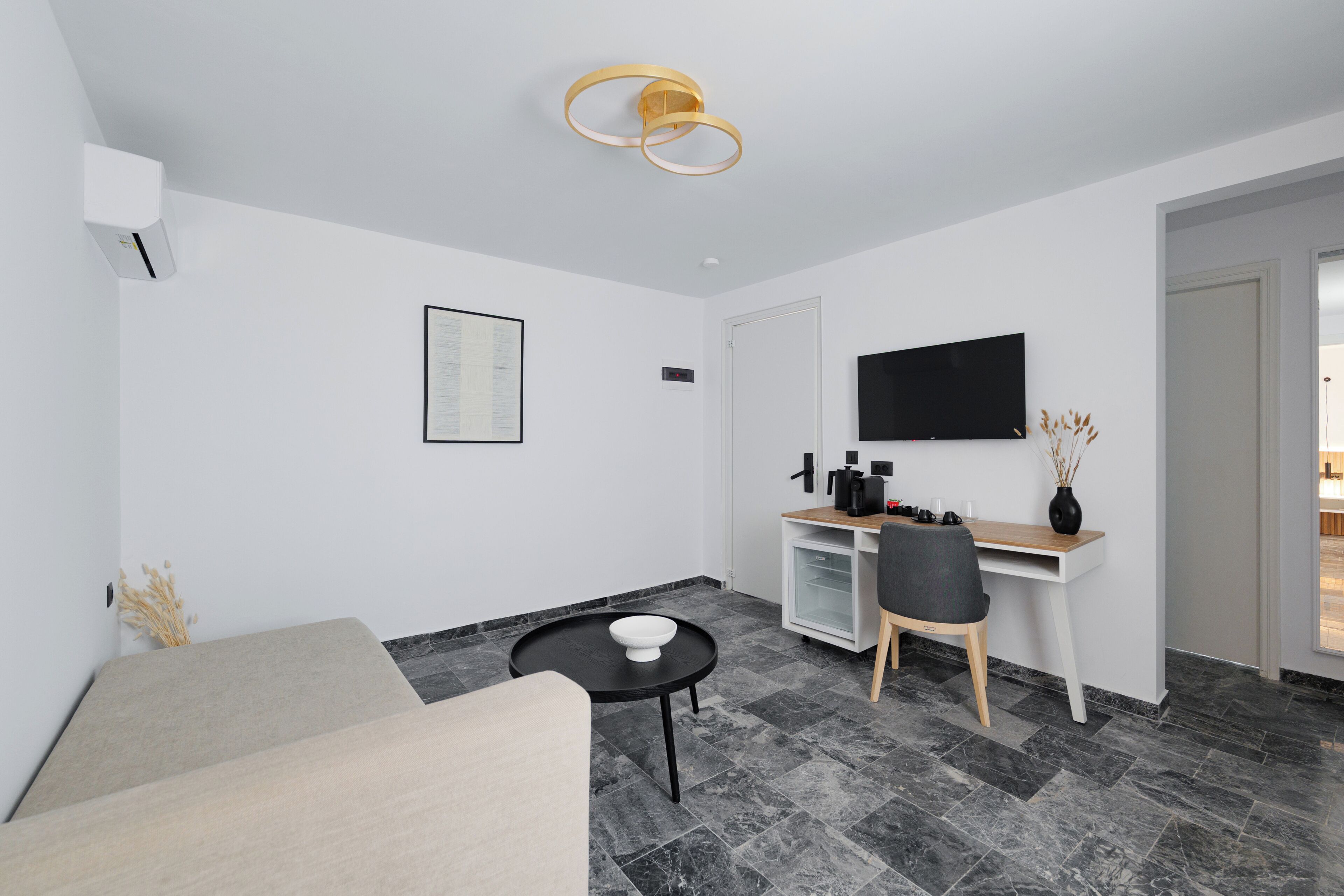 Classic Suite | Living area | 50-inch Smart TV with cable channels, Netflix, streaming services