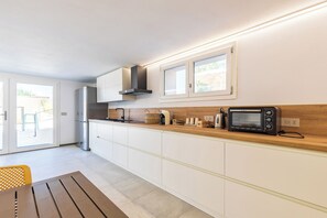 Apartment, Pool View | Private kitchen | Full-size fridge, coffee grinder, cookware/dishes/utensils - Resort Beach San Gemiliano (Arbatax)