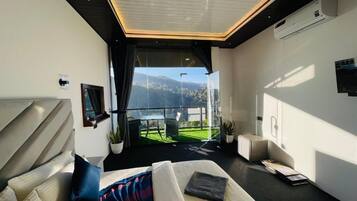 Deluxe Double Room, Balcony, Mountain View | In-room safe, iron/ironing board