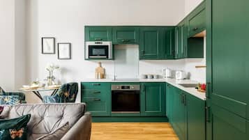 Appartement, 1 grand lit | Cuisine privée | Chaise haute