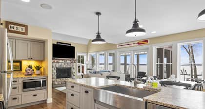 NEW! Direct Lake Leelanau home with dock & mooring, A/C, firepit sleeps 6
