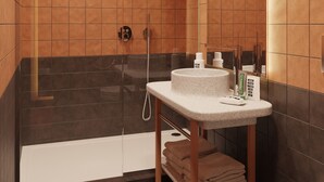 A modern bathroom with a shower, a bathtub, and a toilet. - Mama Shelter Cape Town (CAPE TOWN)