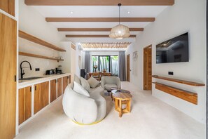 Villa Luxe, vue piscine | Coin séjour