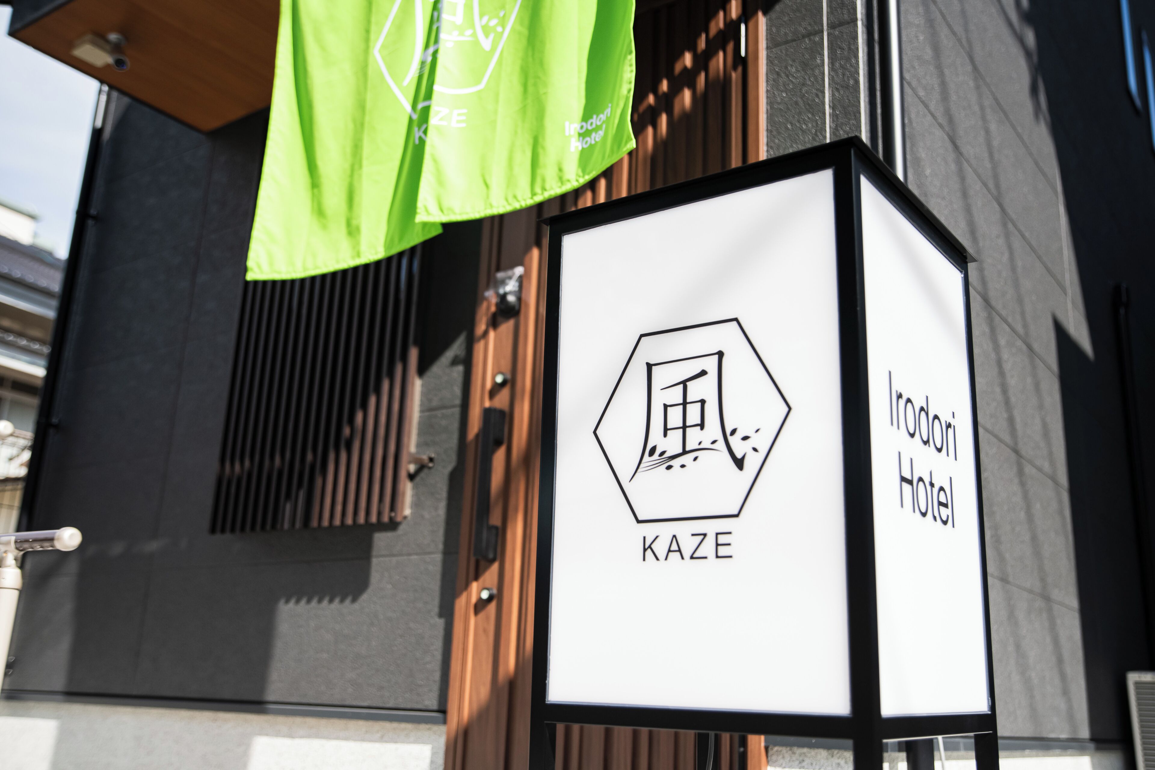 A sign for Irodori Hotel with a KAZE logo.