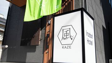 A sign for Irodori Hotel with a KAZE logo.