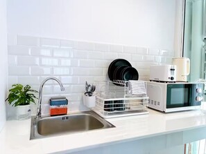 Fridge, microwave, electric kettle, toaster