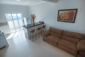 Living area - Souza Apart 1 - Apartamentos completos  (São Tomé das Letras)