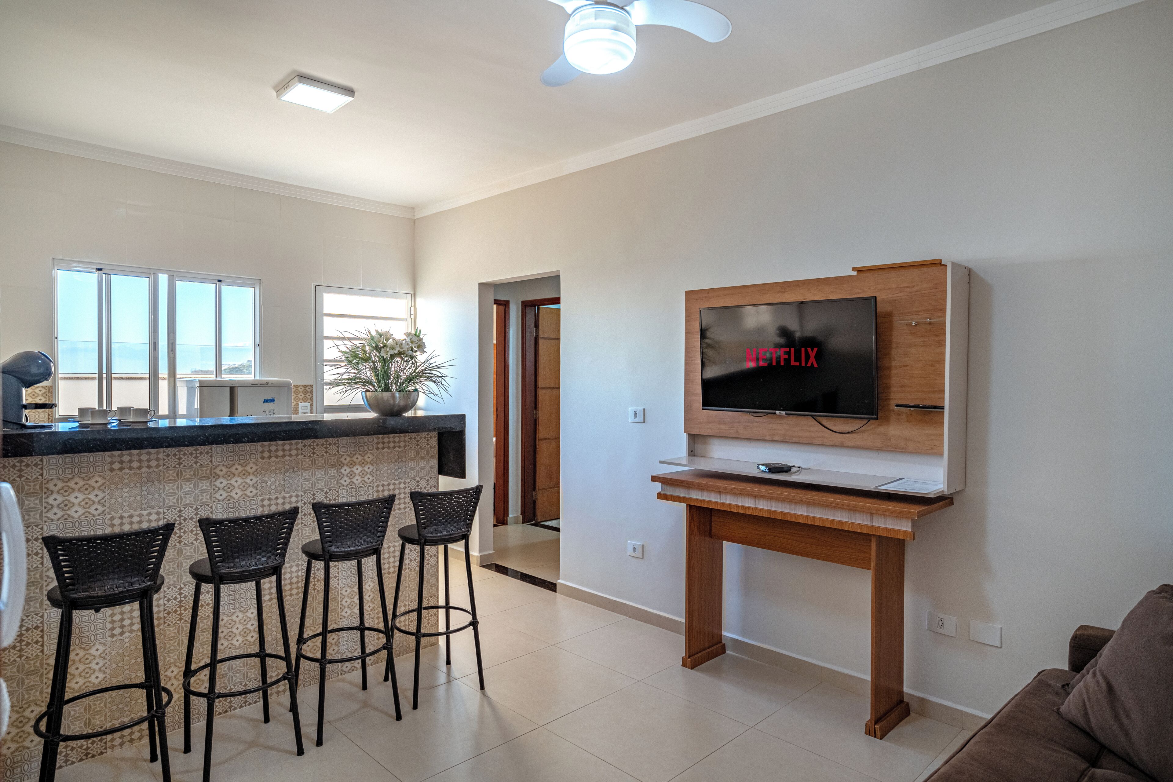 Appartement Confort, véranda, vue ville | Cuisine privée