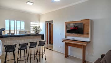 Appartement Confort, véranda, vue ville | Cuisine privée