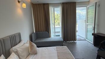 Executive Room, Balcony, Hill View | Soundproofing, iron/ironing board, free WiFi