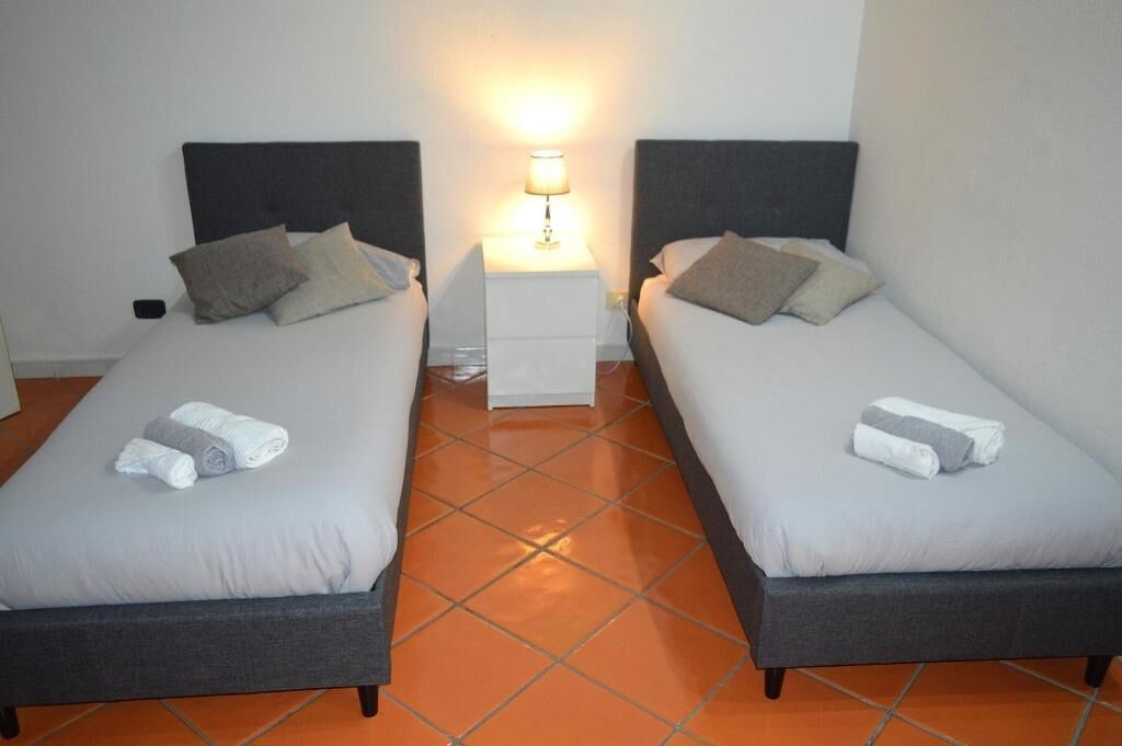 Double or Twin Room, Patio, Courtyard View | In-room safe, iron/ironing board, free WiFi, wheelchair access
