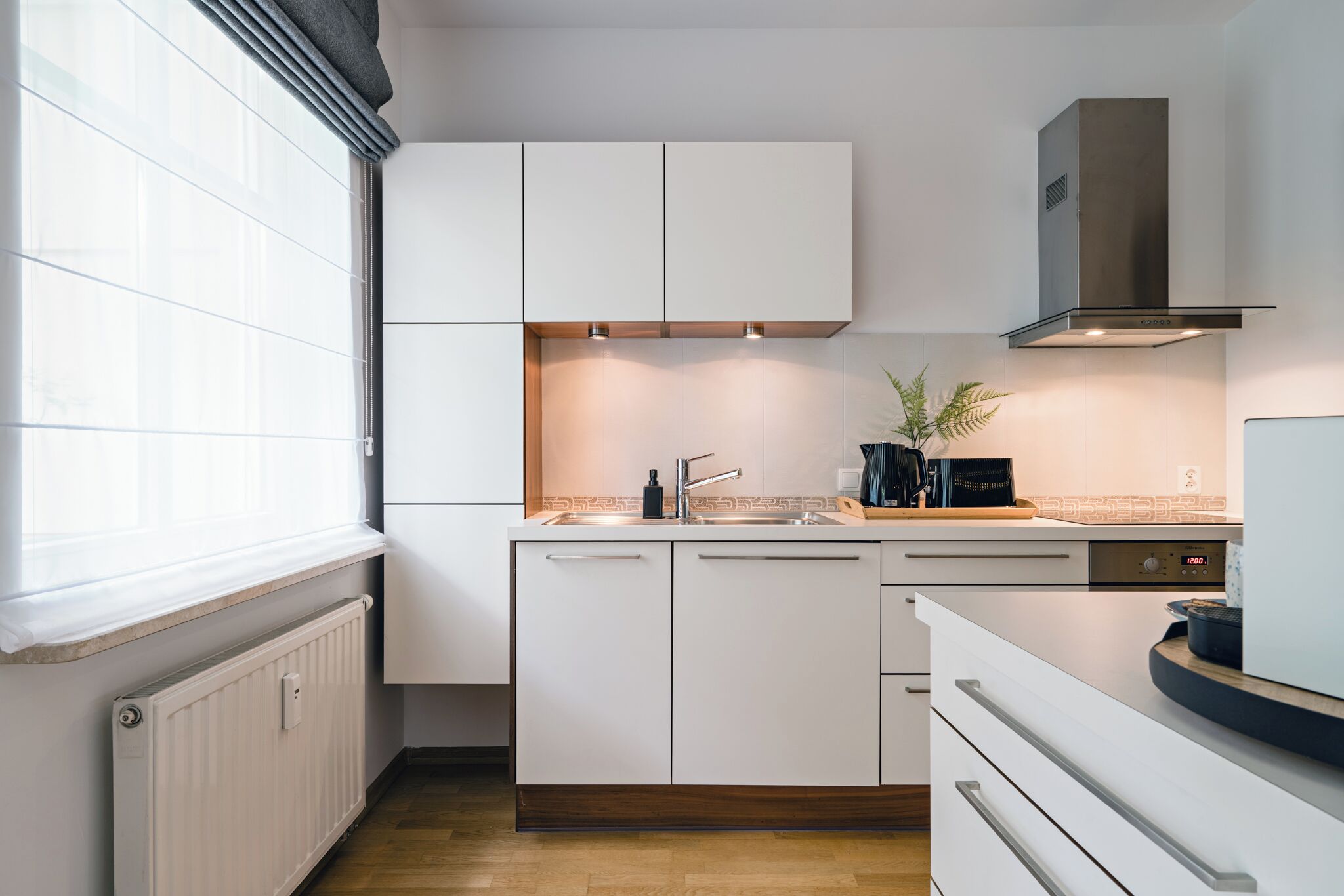 Apartamento familiar, 2 habitaciones, vistas al patio | Cocina privada | Cafetera o tetera, hervidor eléctrico, tostadora y trona infantil