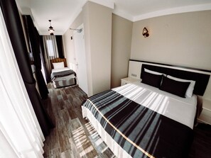 Standard-Dreibettzimmer
