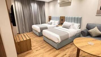 Deluxe Studio, City View | In-room safe, iron/ironing board, free WiFi
