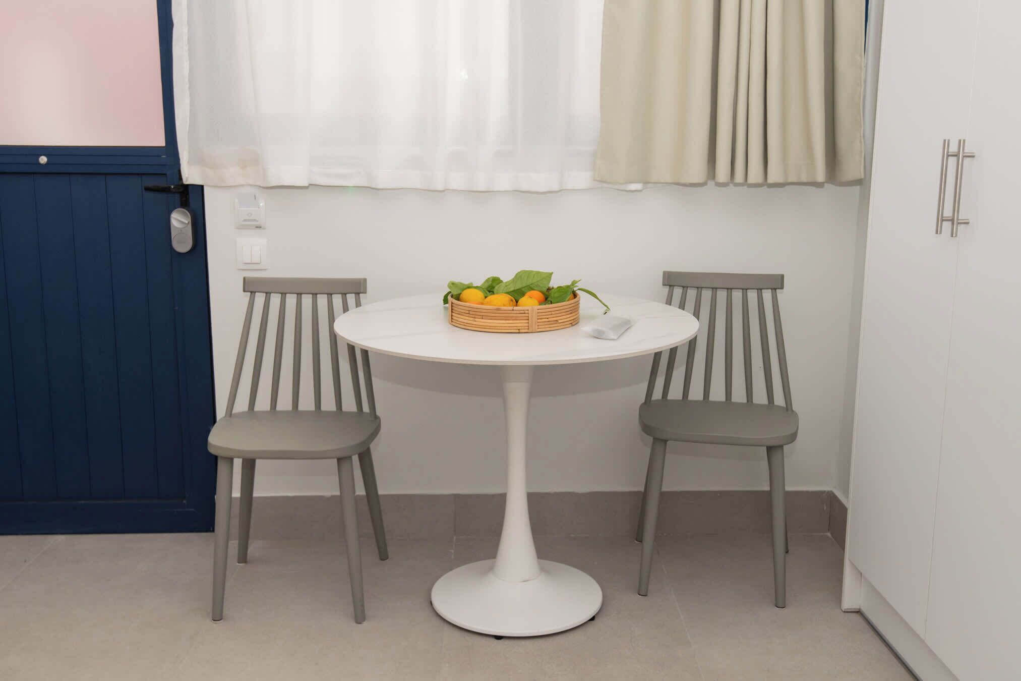 Bright dining nook perfect for breakfast before exploring Mani