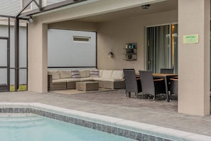 Outdoor dining - 8BR house with pool near Disney area (Davenport)