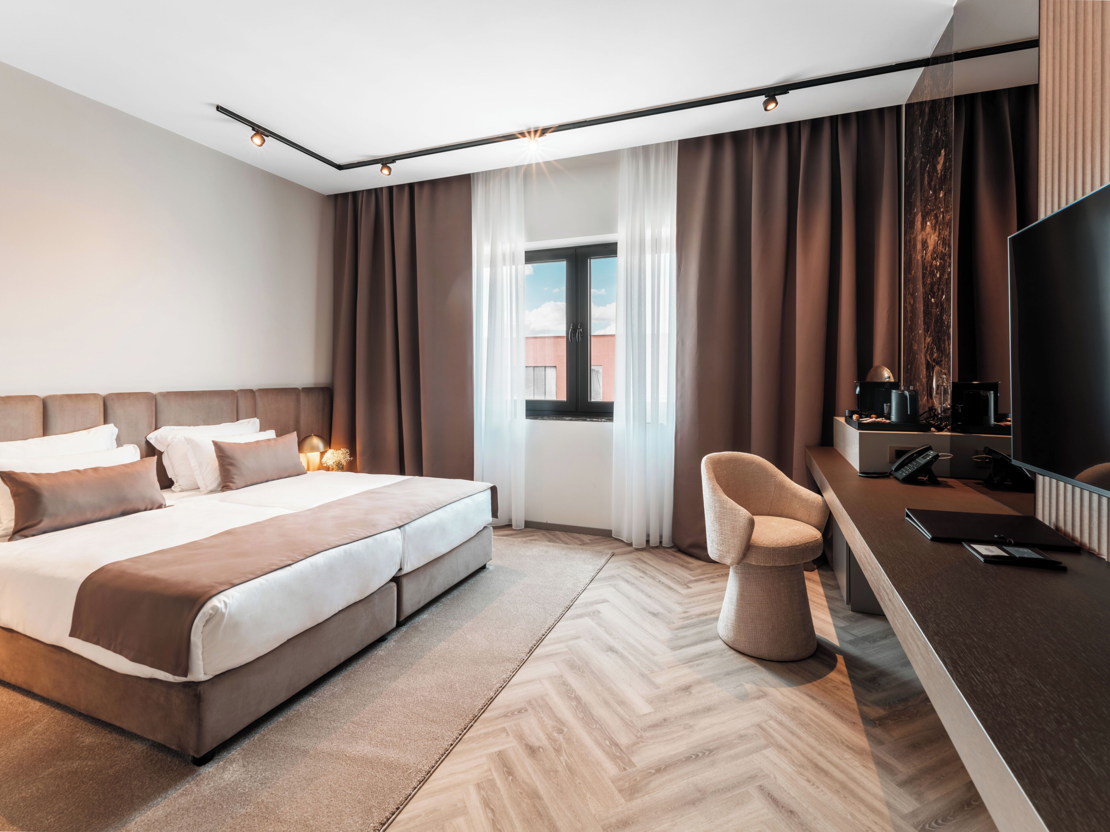 Superior Double Room - City View | Minibar, in-room safe, desk, laptop workspace