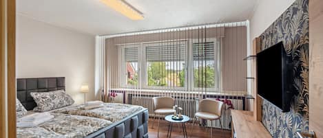 2 chambres, fer et planche à repasser, Wi-Fi, draps fournis