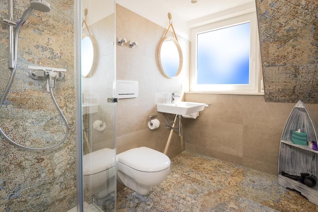 Double Room, Balcony, Lake View | Bathroom | Shower, hair dryer, towels, soap