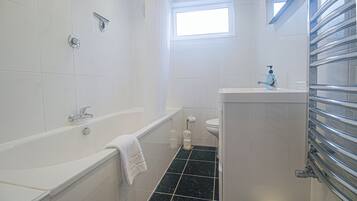 Hair dryer, towels, soap, shampoo
