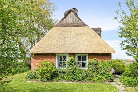 Exterior. Holiday Home 'Achtern Diek' with Private Terrace, Garden and Wi-Fi