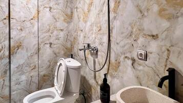 Deluxe Double Room, Balcony, Pool View | Bathroom | Bathrobes, slippers